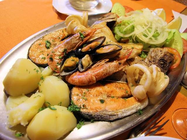 A platter of grilled Canary fish, seafood and papas arrugadas